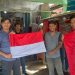 Ditresnarkoba Polda Kepri Bagikan Bendera Merah Putih Kepada Masyarakat