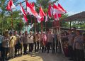 Ditreskrimsus Polda Kepri Bersama Masyarakat Pasang Bendera Merah Putih Dalam Rangka HUT RI KE-81 Tahun 2026